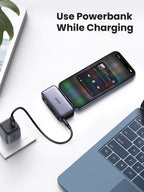 UGREEN Power Bank (5000mAh 22.5W, Mini, Cable Free) functions as a portable charger that supports pass-through charging, allowing you to charge your phone while the power bank itself is plugged in at a desk or wall outlet.